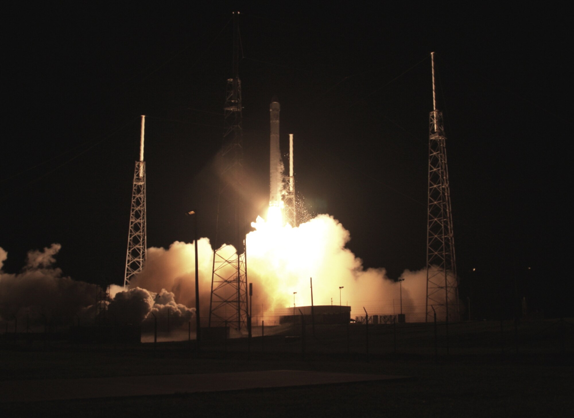 Air Force Reserve combat-search-and-rescue Airmen from the 920th Rescue Wing, Patrick Air Force Base, Fla., supported the successful night time launch of the Space Exploration Technologies (SpaceX) Falcon 9 Dragon rocket. (Courtesy photo/Alan Walters) 