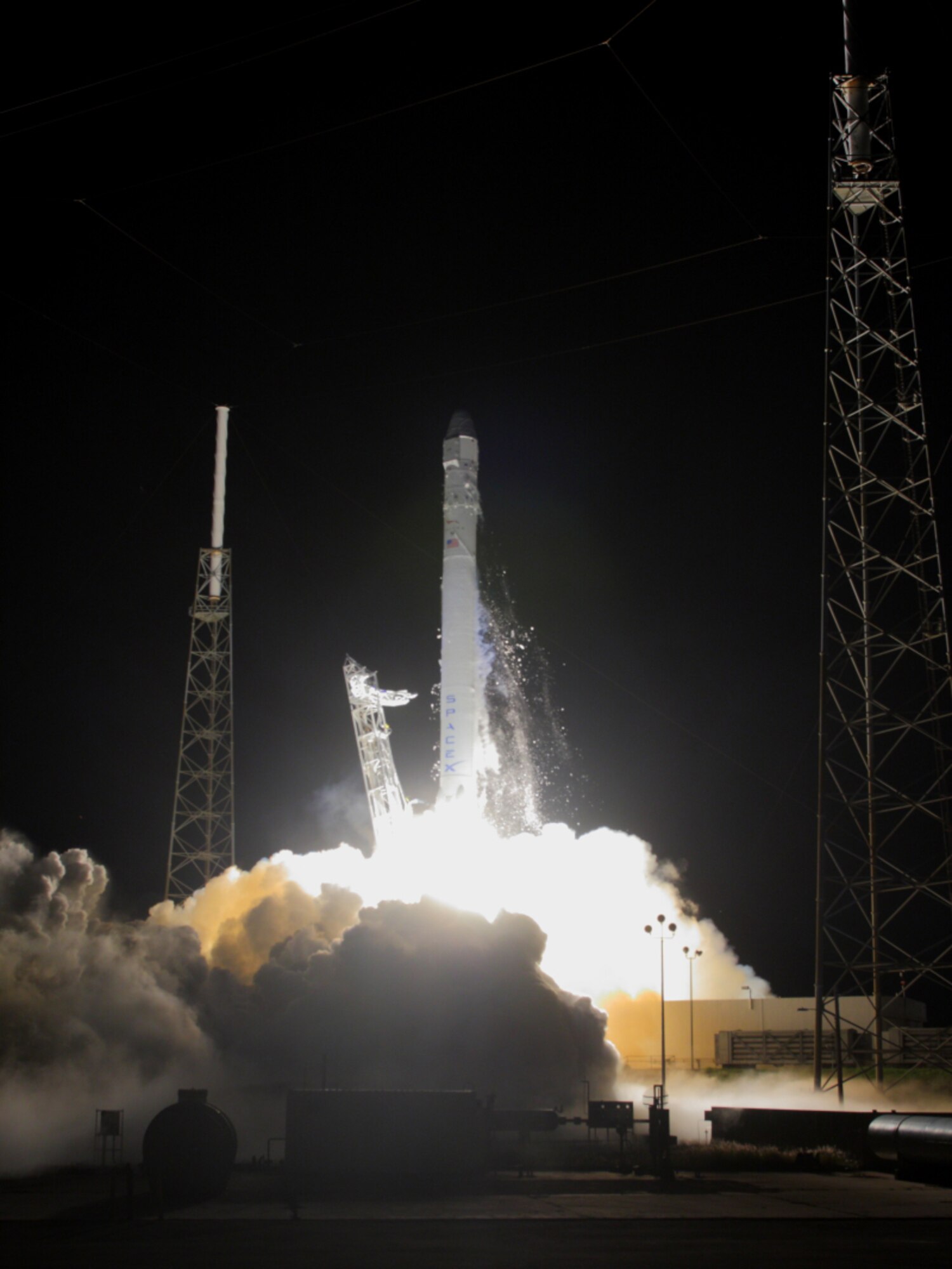 Air Force Reserve combat-search-and-rescue Airmen from the 920th Rescue Wing, Patrick Air Force Base, Fla., supported the successful night time launch of the Space Exploration Technologies (SpaceX) Falcon 9 Dragon rocket. (Courtesy photo/Alan Walters) 