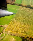 New Wilmington, Penn. -- The Irons Mill Farmstead, New Wilmington, Pa. 910th Airlift Wing C-130 corn maze is seen through the window of a C-130H Hercules aircraft. The maze is featured at a fall festival through the last weekend in Oct. and was designed to honor the Citizen Airmen of the 910th Airlift Wing. U.S. Air Force photo by Mr. Eric M. White