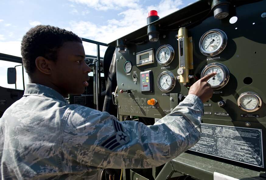 Senior Airman Matthew Henson, 2nd Logistics Readiness Squadron Fuels Flight, checks the gauges on an R-12 hydrant truck as it pulls the fuel from a B-52H Stratofortress on Barksdale Air Force Base, La., Oct. 9. The hydrant truck acts as a portable pump, moving fuel between the aircraft and the fuel storage tanks below the flightline, filtering it during the process. This process is much faster than using tanker trucks to refuel aircraft. (U.S. Air Force photo/Staff Sgt. Chad Warren)(RELEASED)