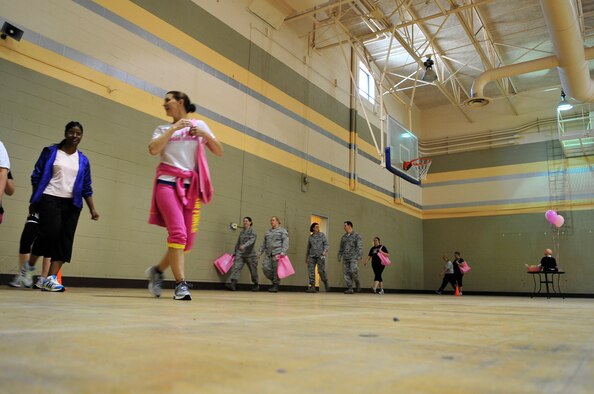 U.S. Air Force Airmen walk for breast cancer awareness at the fitness center, Shaw Air Force Base, S.C., Oct. 2, 2012.  The event was held by the Health and Wellness Center along with the 20th Medical Group.  More than 100 people participated in the walk. (U.S. Air Force photo by Airman Nicole Sikorski/Released)