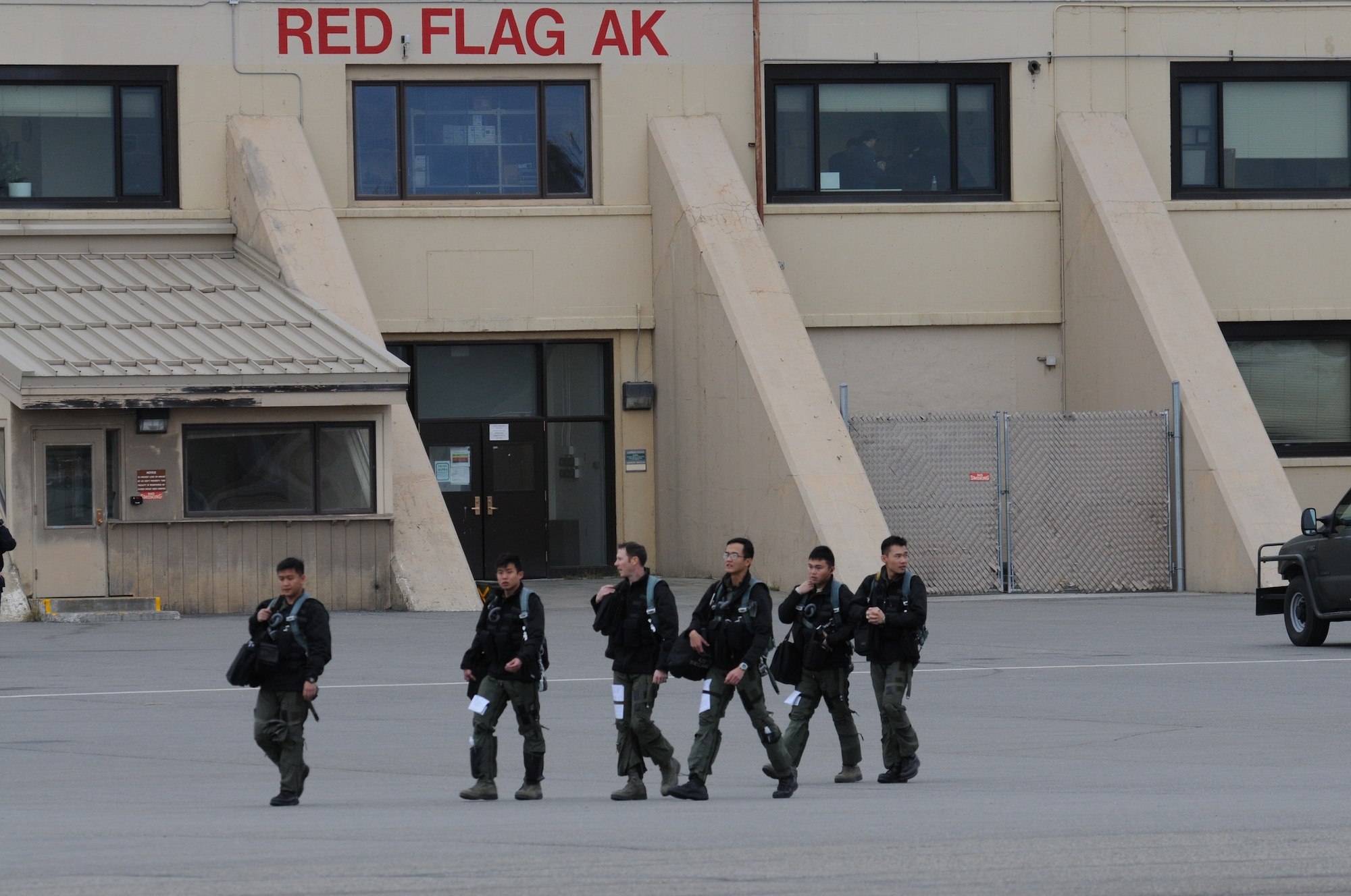 Aircrew assigned to the 428th Fighter Squadron from Mountain Home Air Force Base, Idaho, “step” to their jets Oct. 5, 2012, at Eielson Air Force Base, Alaska. These pilots and weapon system officers are flying today in order to familiarize themselves with the airspace as RED FLAG-Alaska 13-1 begins next week. (U. S. Air Force photo/Senior Airman Benjamin Sutton) 