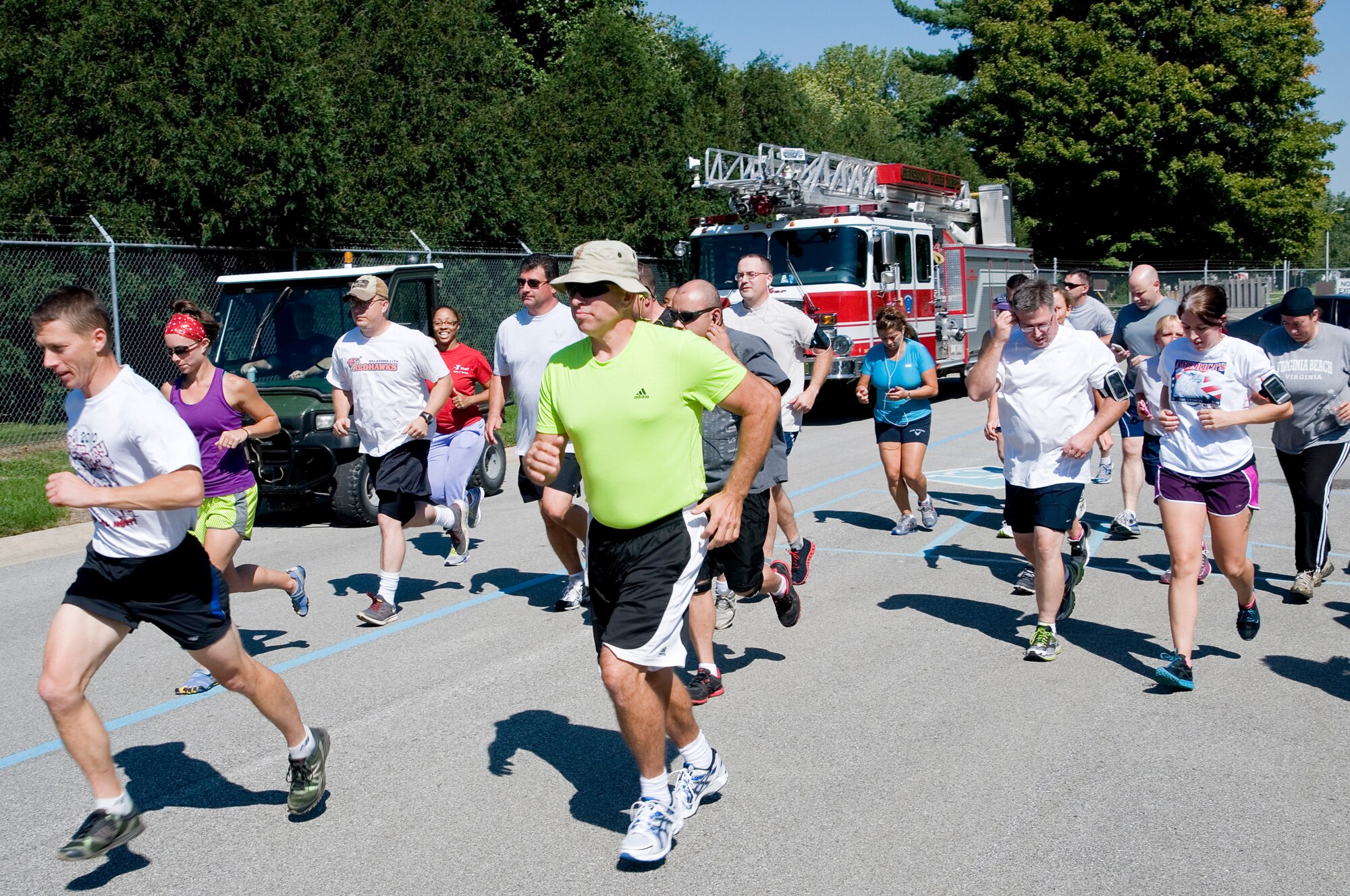 GRISSOM ARB, Ind. -- Civilian and military runners take off at the start of the 5K fun run held here at Grissom Sept 12. The predict-a-time event makes the run competitive for runners of all speeds. (U.S. Air Force photo/SrA. Andrew McLaughlin)