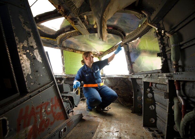 U.S. Air Force Staff Sgt. Kris Wylie, 7th Equipment Maintenance Squadron, inspects the interior fuselage during the restoration of an RB-66 Oct. 4, 2012, at Dyess Air Force Base, Texas. Once restored, the RB-66 will be displayed in the Dyess Linear Airpark. (U.S. Air Force photo by Airman 1st Class Peter Thompson/ Released)