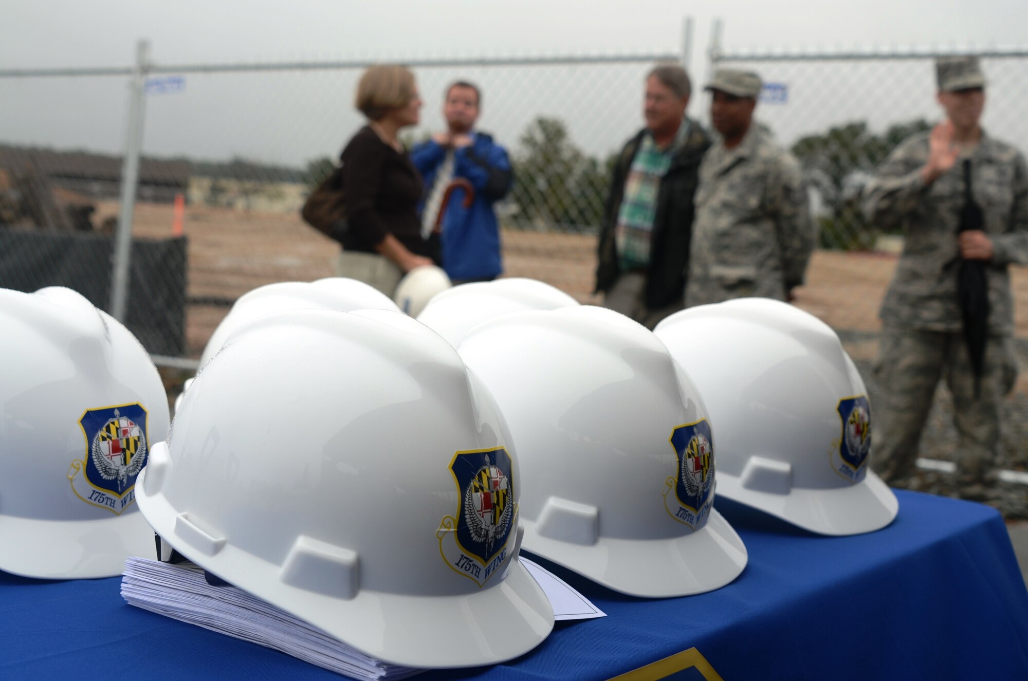 Six hard hats were at the ready for the ceremonial ground breaking at the new 31,500 Square Foot Facility is designed to house the 175th Wing Headquarters, Mission Support Group and Medical Group missions.  This facility has a projected cost $11.8 million, and features multiple green roofs and is anticipated to achieve certified LEED Silver status with the numerous energy enhancement measures upon its completion in 2014.

Functional areas include offices, medical/dental examination and treatment space, classrooms, administration space, command section, conference rooms, telephone switching/data automation center as well as utility systems services and connections. (National Guard photo by Senior Master Sgt. Ed Bard)
