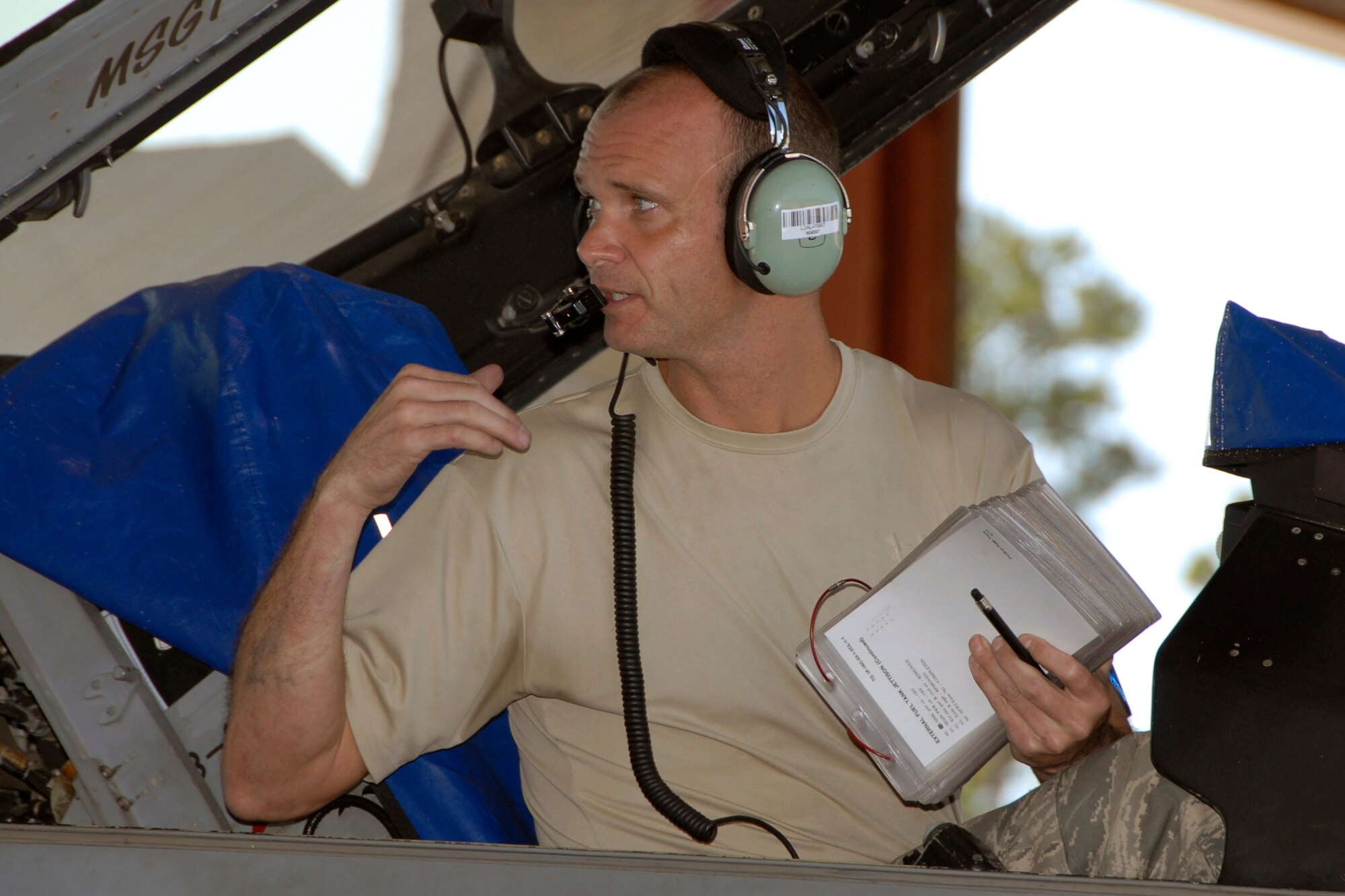 Senior Master Sgt. Brian Norris, a weapons inspector assigned to AFNORTH/1AF from Tyndall Air Force Base, Fla., evaluates a 169th Fighter Wing's weapons load team during a weapons reliability check, Sept. 26, 2012. The McEntire team consists of Master Sgt. Jeremy Pow (pictured), team leader, and Senior Airmen Steven Hollis and Carlos Graham, all assigned to the 169th Fighter Wing's Aerospace Control Alert unit. McEntire Joint National Guard Base's Aerospace Control Alert mission receives an Alert Force Operational Assessment (AFOA) inspection from 1st AF/AFNORTH to evaluate its ability to provide for our nation's homeland defense.  McEntire is home of the Swamp Foxes of the South Carolina Air National Guard and the 169th Fighter Wing.