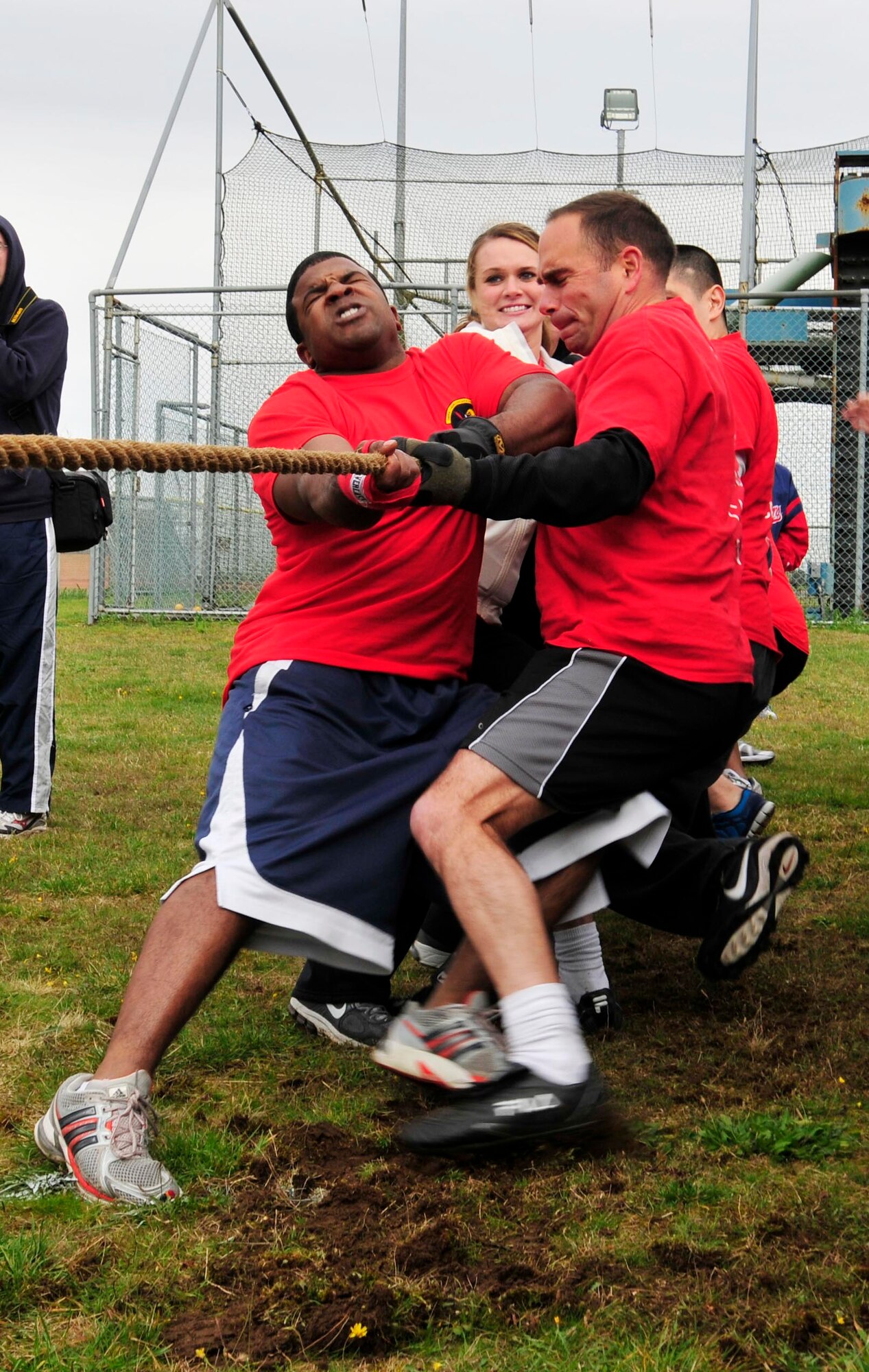 ROYAL AIR FORCE LAKENHEATH, England - Members of the 100th Communications Squadron pull a rope during a game of tug-of-war against the 48th CS at the softball fields Oct. 5, 2012. The two squadrons gathered for a day of friendly competition in kickball, ultimate frisbee, dodgeball and other activities. (U.S. Air Force photo by Senior Airman Tiffany M. Grigg)