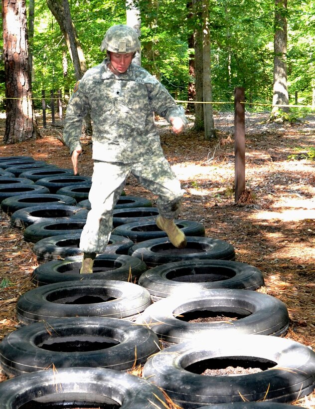 U.S. Army Spc. James Conklin, a Soldier assigned to the 597th Transportation Brigade, completes a tire run on the obstacle course at Fort Eustis, Va., Oct. 5, 2012. Conklin, an 88H cargo specialist with the 690th Transportation Detachment (Rapid Port Opening Element), 833rd Transportation Battalion, 597th Transportation Brigade of the Military Surface Deployment and Distribution Command, has been in the Army nearly four years, and is certified in combatives level one and two, combat-life savers, field sanitation and as a bus driver. (U.S. Army photo by Michelle Montieth/Released)