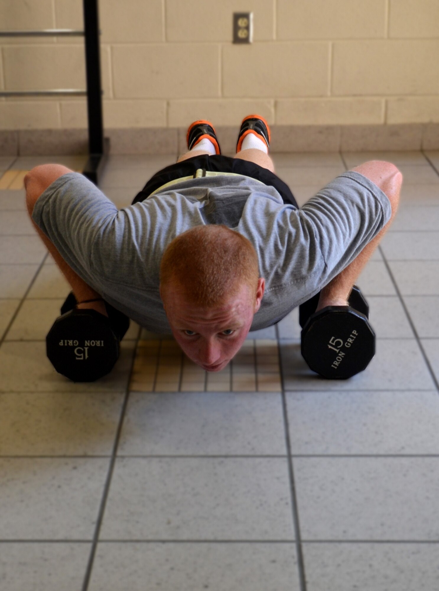 U.S. Army Spc. James Conklin, a Soldier assigned to the 597th Transportation Brigade, performs push-ups at Fort Eustis, Va., Oct. 5, 2012. Conklin is training in preparation for the Army's Best Warrior Competition at Fort Lee, Va., Oct. 15-18, where he will compete against the Army's finest Soldiers and noncomissioned officers in a series of tests to determine the force's best Soldier. (U.S. Army photo by Michelle Montieth/Released)