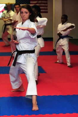 Aerial Vineyard, 15, performs kata during her karate practice in Goldsboro, N.C., Oct. 2, 2012. Aerial has practiced karate since 2008 and will test for her black belt in November. Aerieal is the daughter of Tech. Sgt. Michael Vineyard, 335th Aircraft Maintenance Unit flight line expeditor. (U.S. Air Force photo/Airman 1st Class Aubrey Robinson/Released)