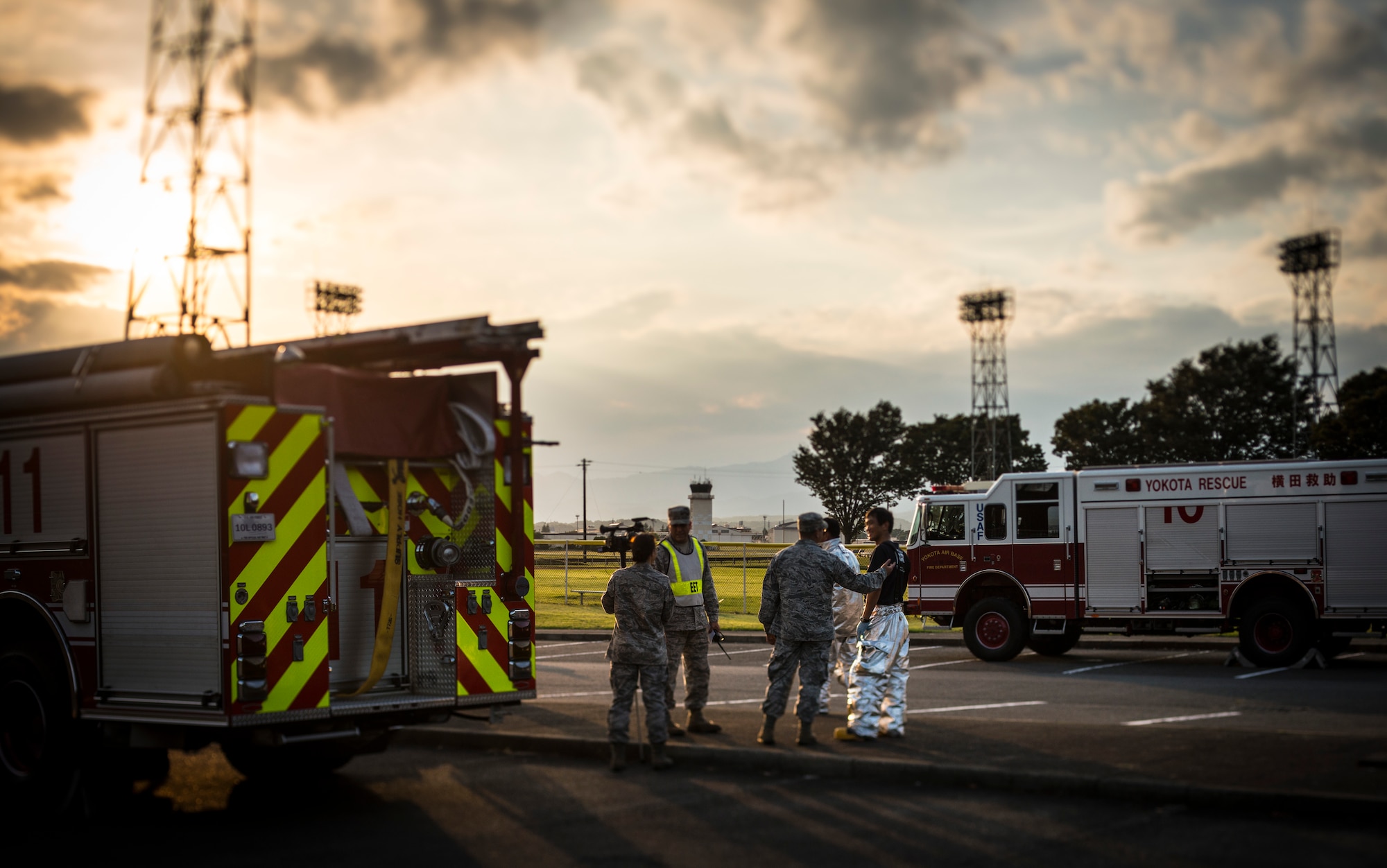 YOKOTA AIR BASE, Japan -- First responder leaders reflect on a completed emergency management exercise at Yokota Air Base, Japan, Oct. 5, 2012. The exercise only lasted an hour, but served as an important training tool for Yokota's first responders. (U.S. Air Force photo by Tech. Sgt. Samuel Morse)