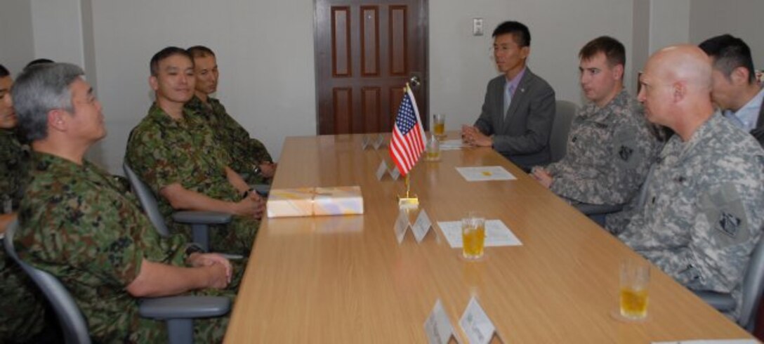 (From left): Japan Ground Self-Defense Force Maj. Gen. Masafumi Akamatsu, Capt. Thomas Douglas and Lt. Col. James C. Horton Jr., commence the 2012 Unit School Exchange Program between the JGSDF and the Japan Engineer District.