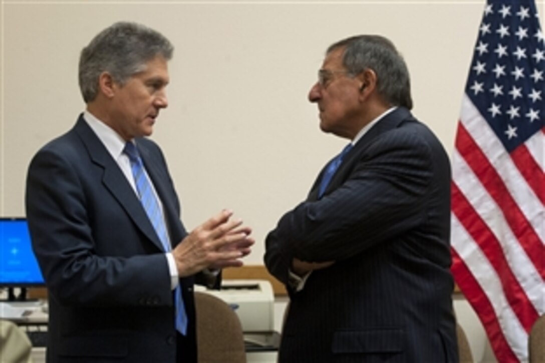 U.S. Defense Secretary Leon E. Panetta meets with Australian Defense Minister Stephen Smith during a conference of NATO defense ministers and North Atlantic Council members in Brussels, Oct. 9, 2012. Panetta is scheduled to meet with several defense ministers during the two-day event.