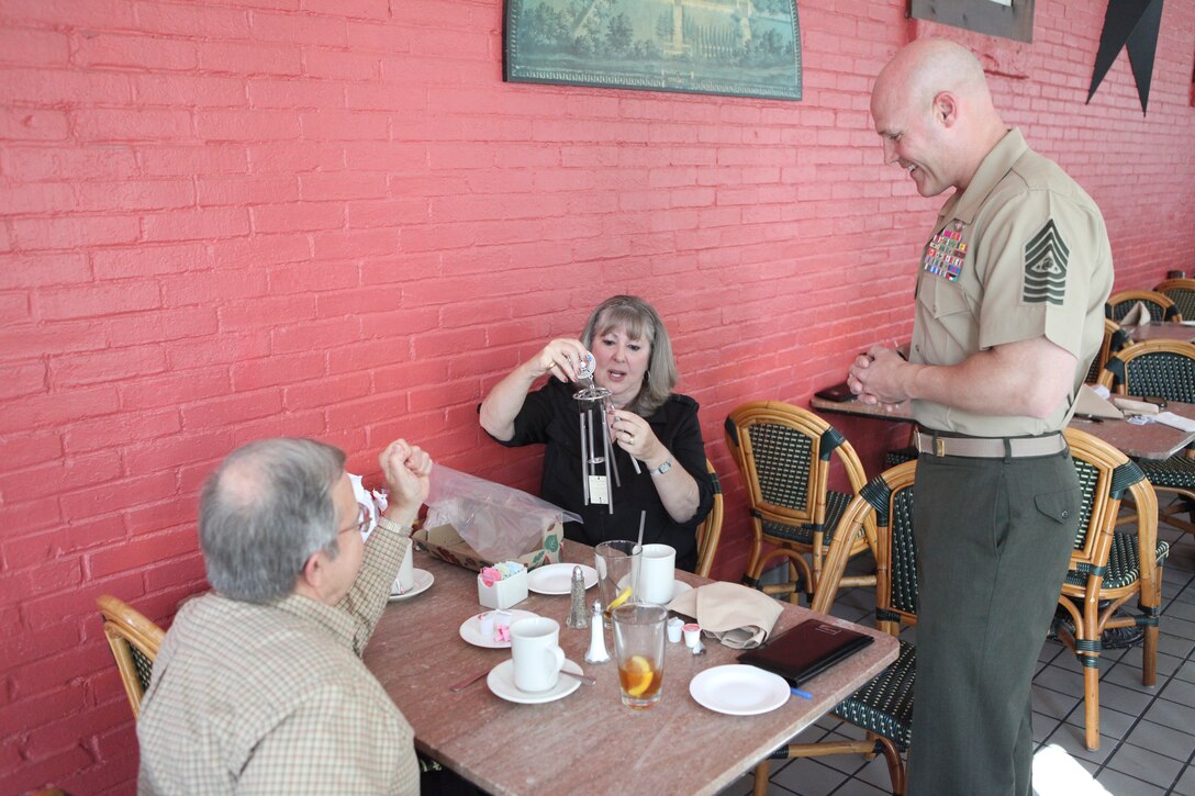 Sgt. Maj. Micheal P. Barrett, the 17th Sergeant Major of the Marine Corps, visits with Richard and Rose Blizzard, volunteers with Paws and people assisitng Wounded Warriors, in Westminster, Md., Oct. 1, 2012. (U.S. Marine Corps photo by Cpl. Cody A. Fodale)