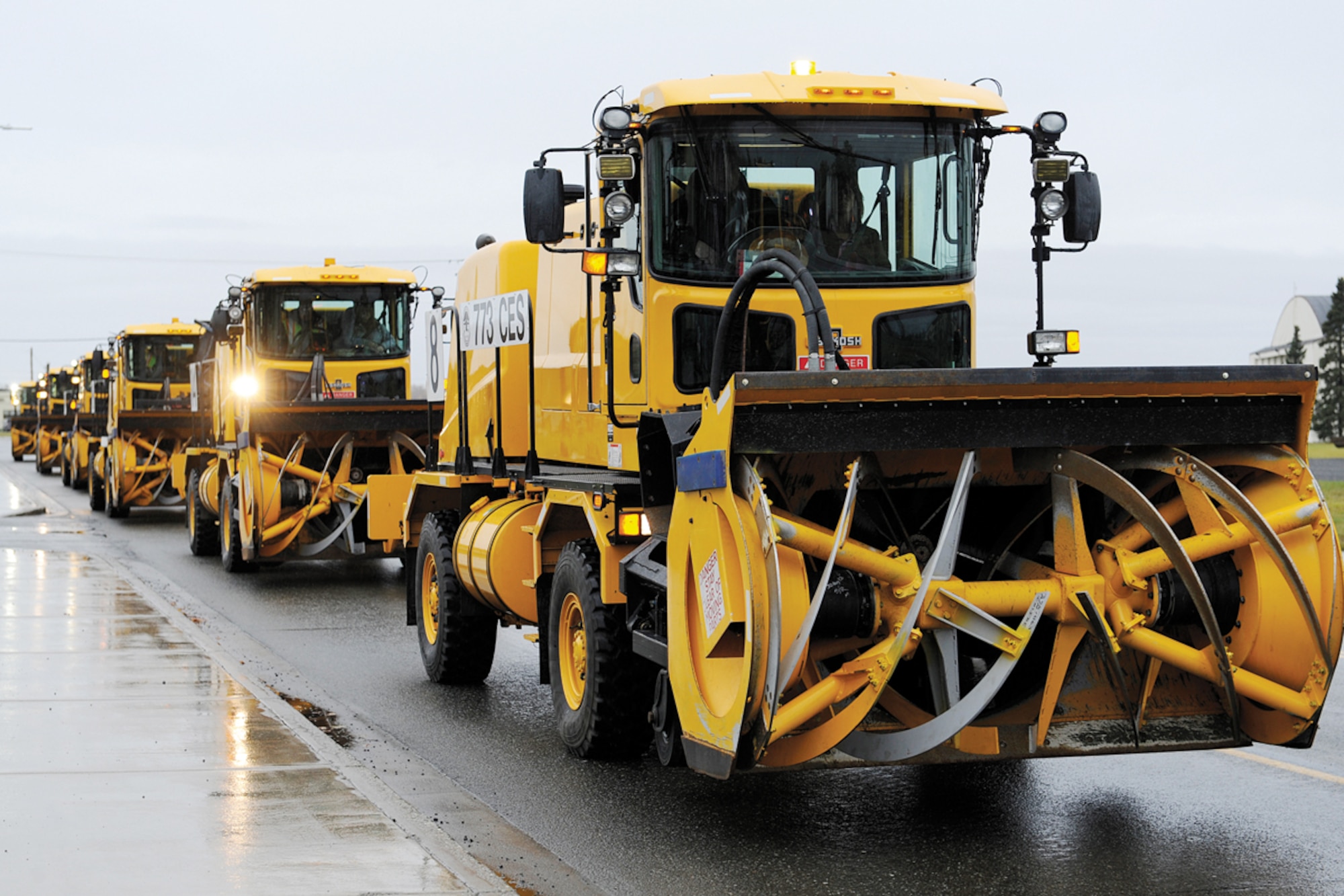 Snow removal vehicles from the 773rd Civil Engineer Squadron form up as part of the Snow Parade on Joint Base Elmendorf-Richardson, Oct. 5, 2012. The parade showcases the snow removal vehicles that not everyone sees everyday. (U.S. Air Force photo/Staff Sgt. Zachary Wolf)