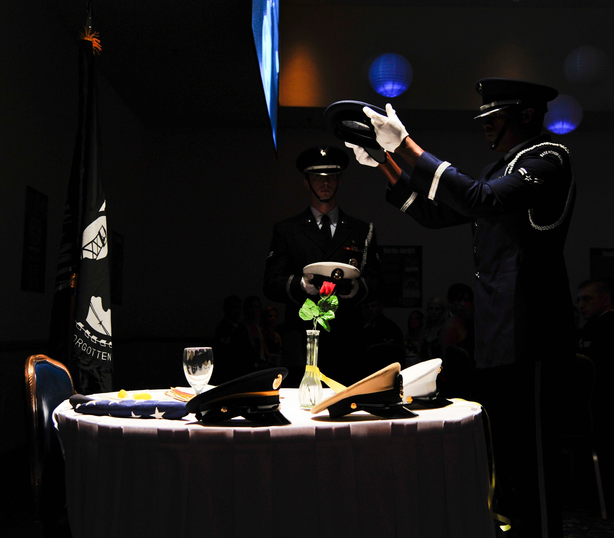 VANDENBERG AIR FORCE BASE, Calif. – Vandenberg Honor Guard members perform the MIA/POW ceremony during the Air Force Ball at the Pacific Coast Club here Friday, Oct. 5,2012. The Air Force Ball celebrated the 65th birthday and the 30th anniversary of AFSPC. (U.S. Air Force photo/Senior Airman Lael Huss)