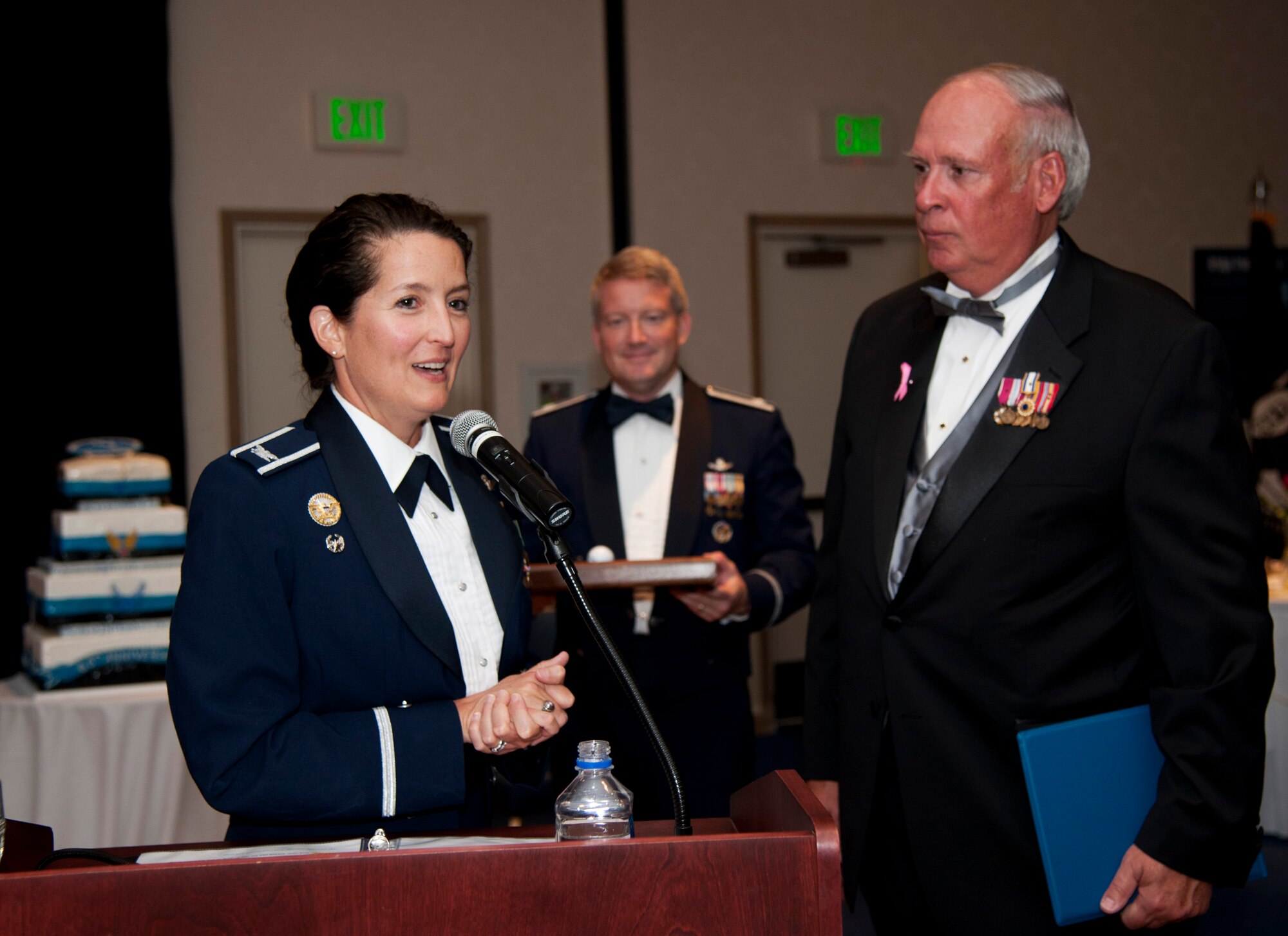 VANDENBERG AIR FORCE BASE, Calif. – Col. Nina Armagno, 30th Space Wing commander, shows retired Gen. Lance W. Lord, former Air Force Space Command commander, an old golf ball during the Air Force Ball at the Pacific Coast Club here Friday, Oct. 5, 2012. The golf ball, monogrammed with four stars and an Air Force Space Command crest, was dredged from a lake at Patrick Air Force Base, Fla., by Lt. Gen. Susan Helms, now 14th Air Force commander, after Lord played golf there. The Air Force Ball celebrated the 65th birthday of the Air Force and the 30th anniversary of AFSPC. (U.S. Air Force photo/Senior Airman Lael Huss) 