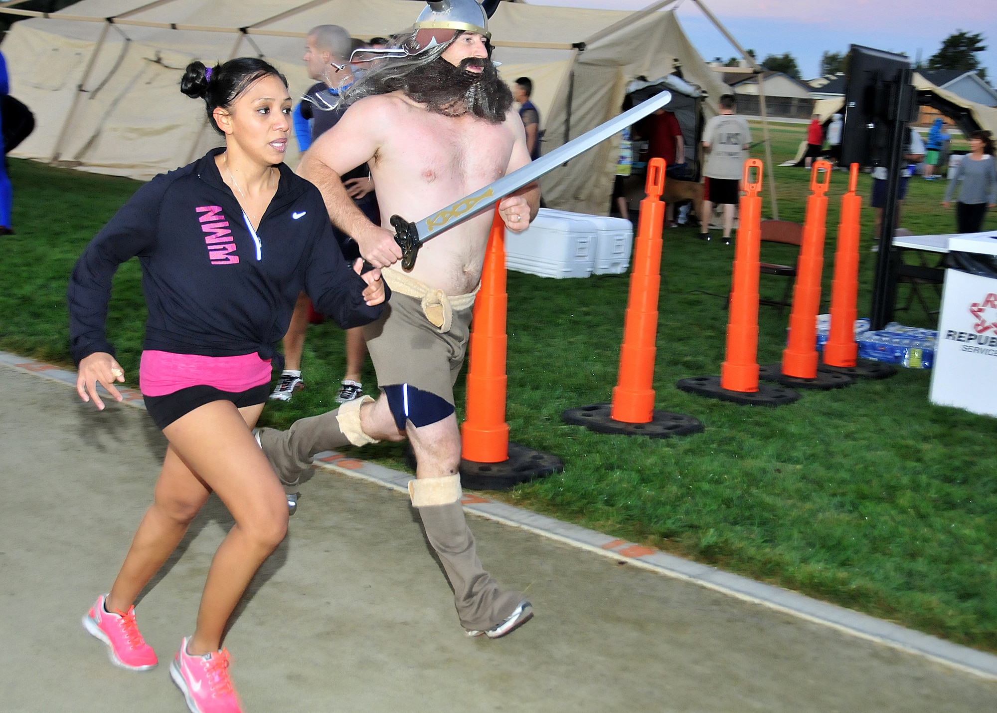 One of the runners throws himself into the role as a viking during this year's 12-hour Viking Challenge relay at GoldenWest Middle School Oct. 6.  Viking Challenge is the largest fundraiser for the Travis Fisher House.  (U.S. Air Force photo by Tech. Sgt. Lesley Waters)