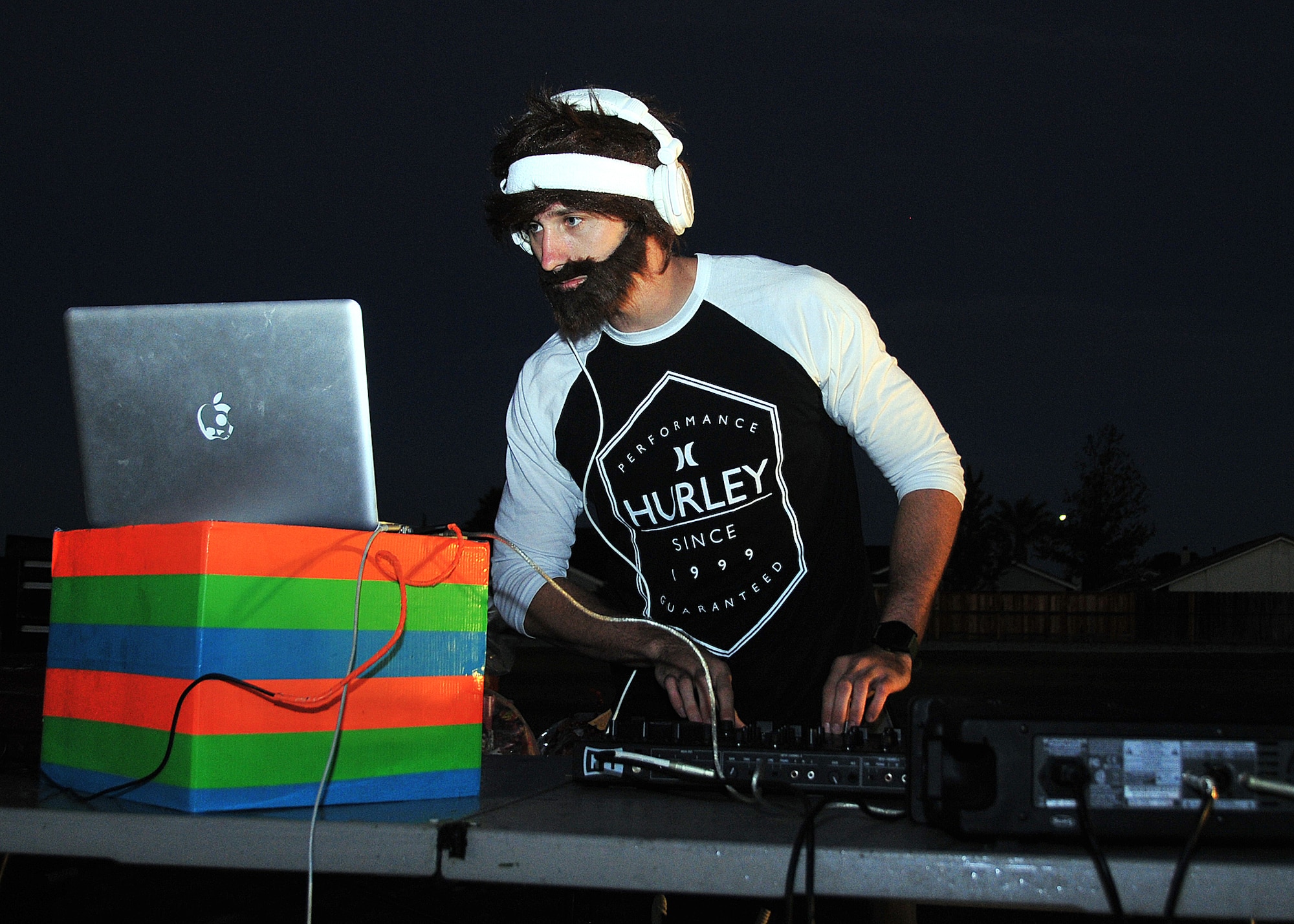 A local disc jockey provides his musical services during the 12-hour Viking Challenge relay at GoldenWest Middle School Oct. 6.  (U.S. Air Force photo by Tech. Sgt. Lesley Waters)