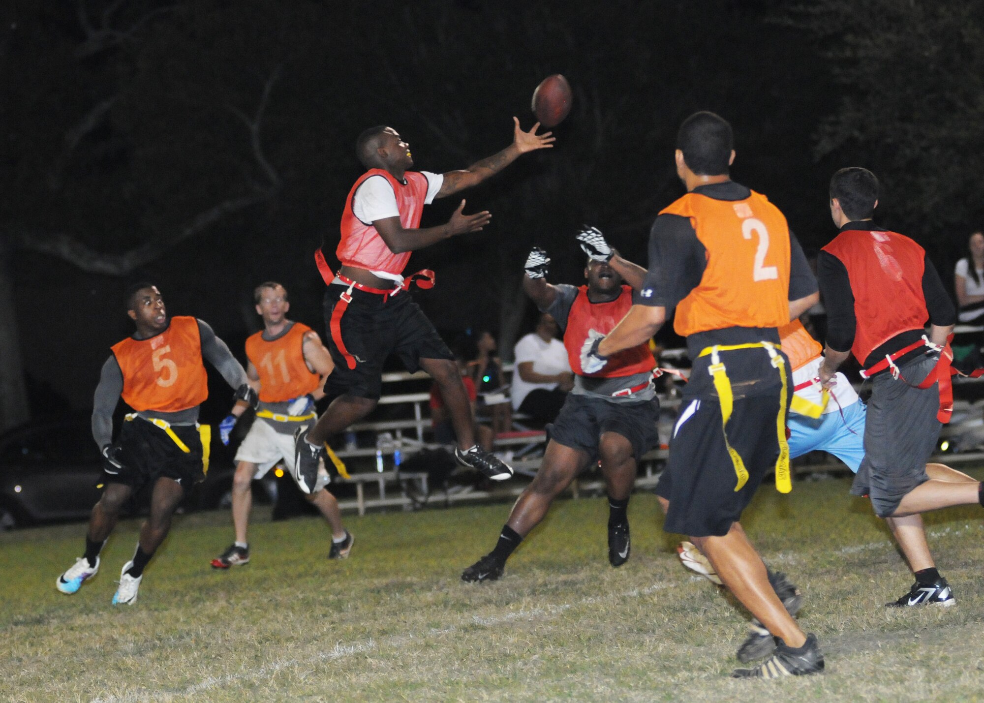 Stephen Johnson, 81st Training Support Squadron, makes a leap in the air for the catch during an intramural flag football game Oct. 4, 2012, at Keesler Air Force Base, Miss. The 81st Security Forces Squadron defeated the 81st TRSS, 21-7.  (U.S. Air Force photo by Kemberly Groue)
