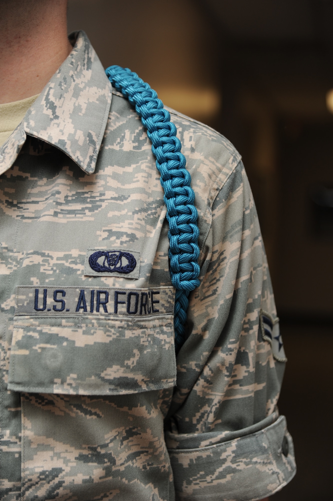 Select airmen will begin wearing teal ropes, which symbolizes sexual assault awareness and support, during the month of October within the student population at Keesler Air Force Base, Miss. Teal Rope members receive specialized training by the sexual assault prevention and response office staff and serve as a link between non-prior service students and SAPRO for information and referral support.  (U.S. Air Force photo by Kemberly Groue)