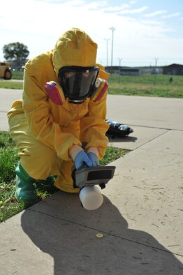 Staff Sgt. Aimee Stark, 509th Medical Operations Squadron Bioenvironmental Engineer, uses a SAM-940 device during a routine equipment check at Whiteman Air Force Base, Mo., Oct. 3, 2012. The Bioenvironmental Flight uses the device to detect radiation sources and different types of isotopes. (U.S. Air Force photo/Heidi Hunt)  (Released)