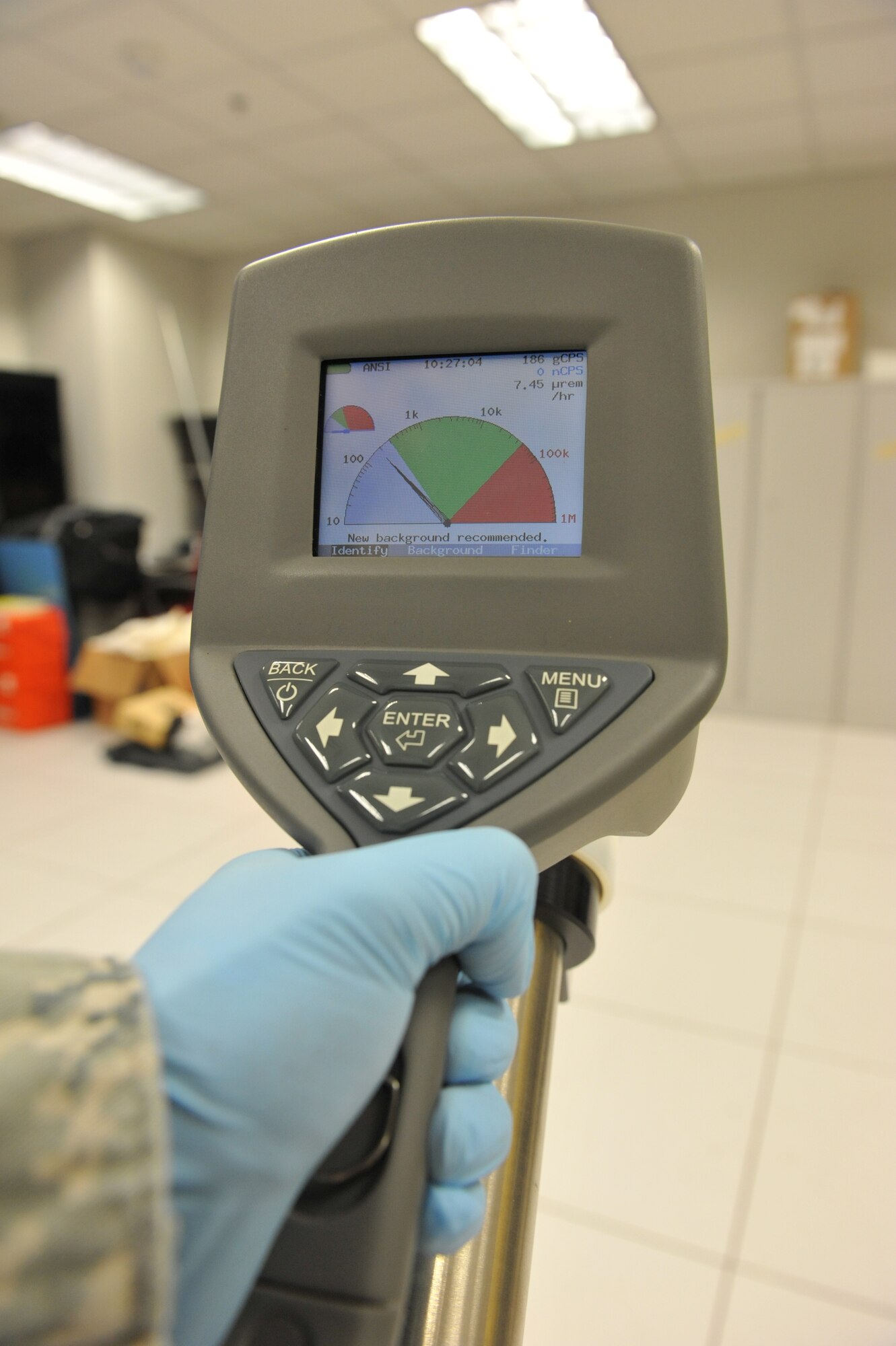 Staff Sgt. Edwin Origel, 509th Medical Operations Squadron Bioenvironmental Engineer, uses a SAM-940 device during a routine equipment check at Whiteman Air Force Base, Mo., Oct. 3, 2012. The Bioenvironmental Flight uses the device to detect radiation sources and different types of isotopes. (U.S. Air Force photo/Heidi Hunt) (Released)