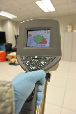 Staff Sgt. Edwin Origel, 509th Medical Operations Squadron Bioenvironmental Engineer, uses a SAM-940 device during a routine equipment check at Whiteman Air Force Base, Mo., Oct. 3, 2012. The Bioenvironmental Flight uses the device to detect radiation sources and different types of isotopes. (U.S. Air Force photo/Heidi Hunt) (Released)
