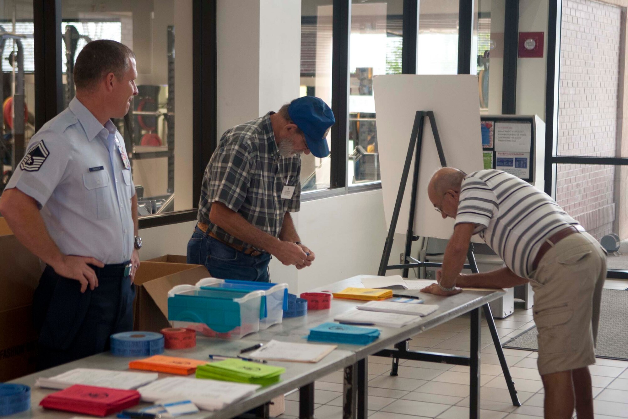 Senior Master Sgt. Claude Paddock, 820th Combat Operations Squadron, volunteers at Retiree Appreciation Day at Moody Air Force Base, Ga., Oct. 6, 2012. Retiree appreciation is a weeklong event dedicated to honoring retirees and providing information on health and various opportunities to take part in. (U.S. Air Force photo by Airman 1st Class Paul Francis/Released)