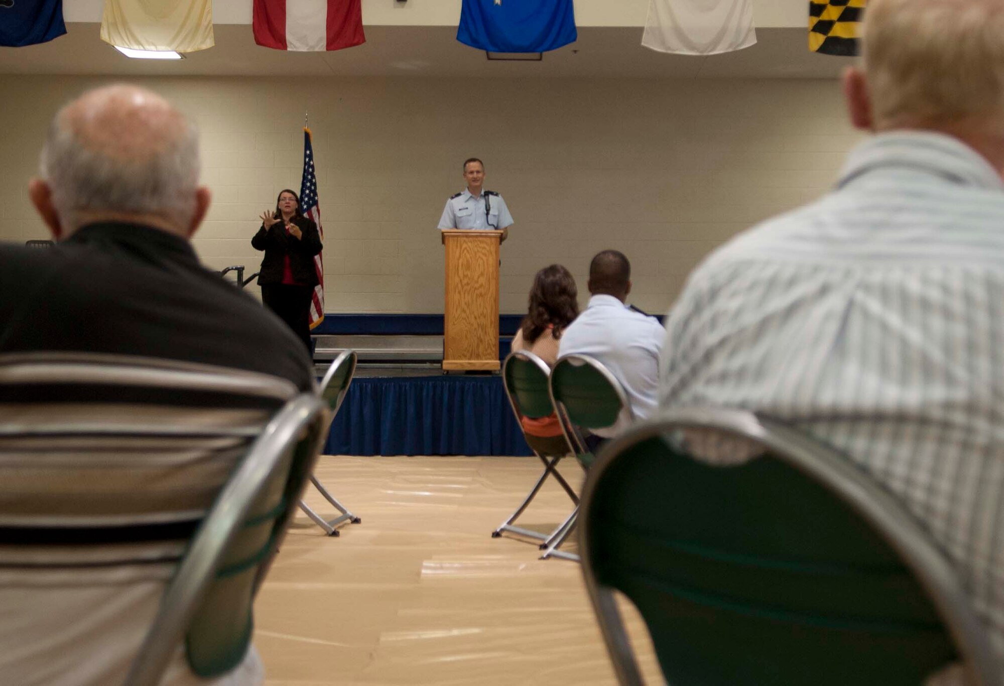 U.S. Air Force Col. Billy Thompson welcomes retirees to Retiree Appreciation Day at Moody Air Force Base, Ga., Oct. 6, 2012. During the week, retirees had an opportunity to participate in a golf tournament, barbeque and a health and information fair. (U.S. Air Force photo by Airman 1st Class Paul Francis/Released)