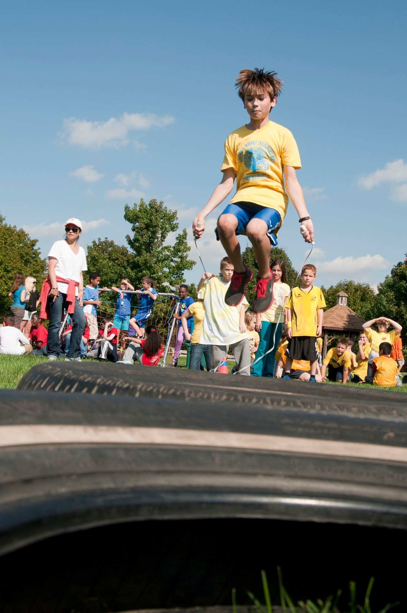 HANSCOM AIR FORCE BASE, Mass. -- Cameron Long, a seventh grader at Hanscom Middle School, jumps rope during the school's field day at the base soccer fields Oct. 5. The students participated in several games and activities during the annual event. (U.S. Air Force photo by Mark Wyatt)