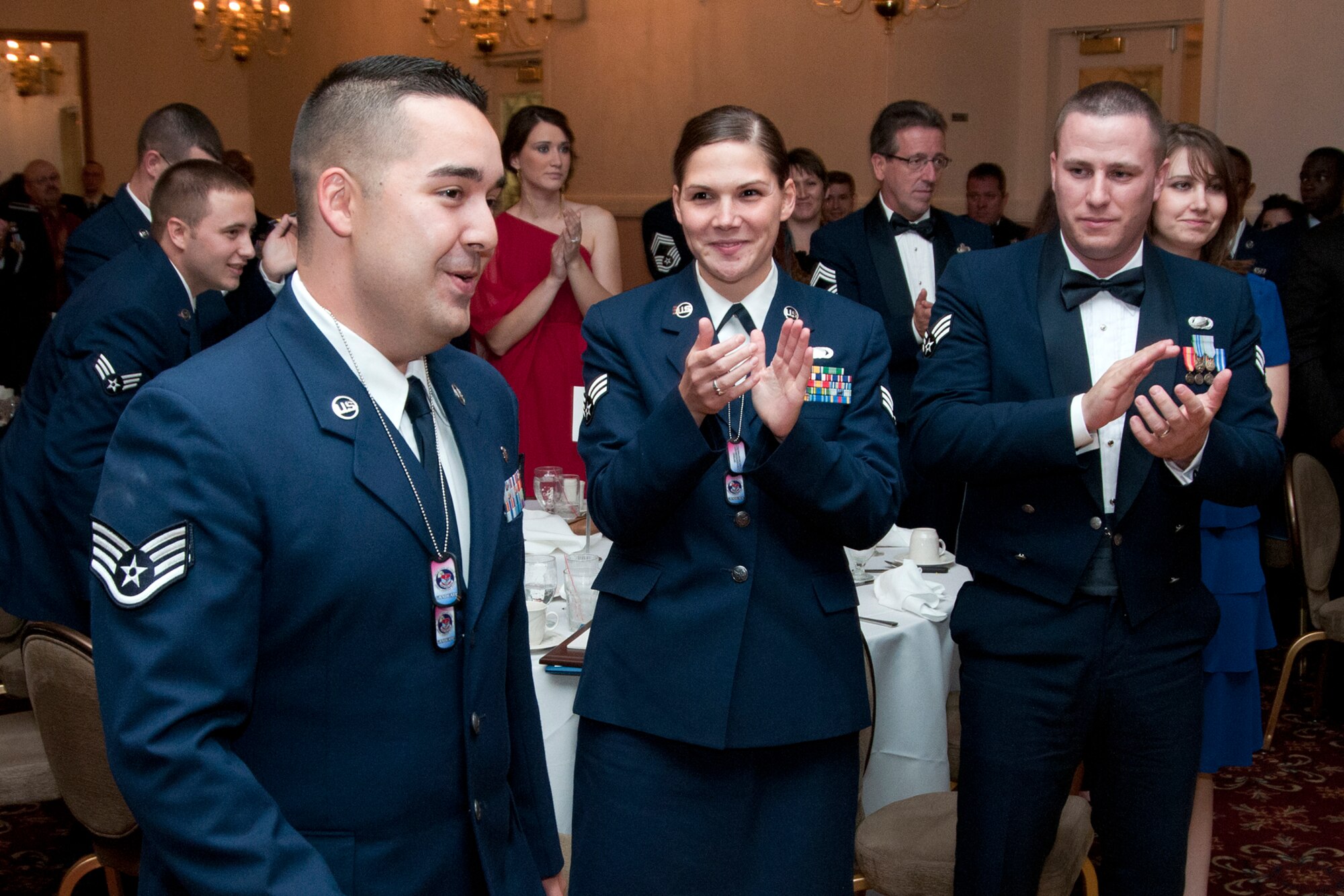 HANSCOM AIR FORCE BASE, Mass. – Airman Leadership School graduation attendees applaud for Senior Airman Richard Riley (left) after he was named the John Levitow Award winner Oct. 5 at the Minuteman Commons. The Levitow Award is the highest award presented at ALS and is presented to the student that demonstrated the most outstanding leadership and scholastic qualities. (U.S. Air Force photo by Mark Wyatt)