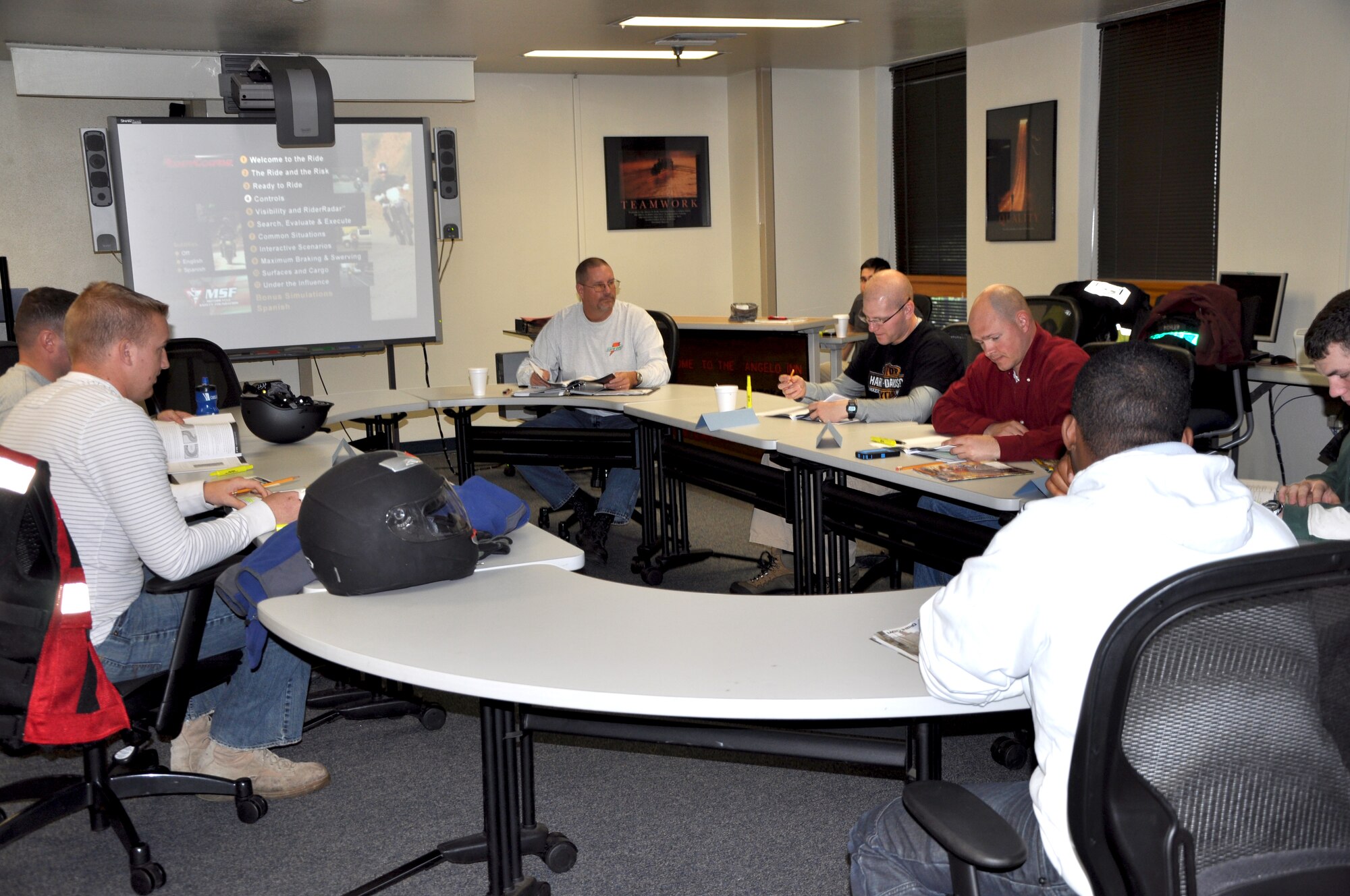 GOODFELLOW AIR FORCE BASE, Texas-- Kevin Groff (center), Motorcycle Safety Foundation RiderCoach, teaches the beginner motorcycle safety course Oct. 6 at the Angelo Inn. This is the first time this course has been taught by local, certified instructors rather than a contractor. (U.S. Air Force photo/Airman 1st Class Jessica Keith) 

