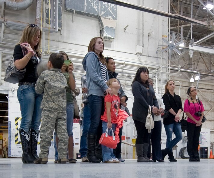 An Airman from the 7th Component Maintenance Squadron explains his role during a 7th CMS Friends and Family Day Oct. 10, 2012, at Dyess Air Force Base, Texas. The 7th CMS Friends and Family Day allowed the Airmen’s significant others a chance to see what it takes to keep the B-1 and C-130J in the air. (U.S. Air Force photo by Airman 1st Class Jonathan Stefanko)