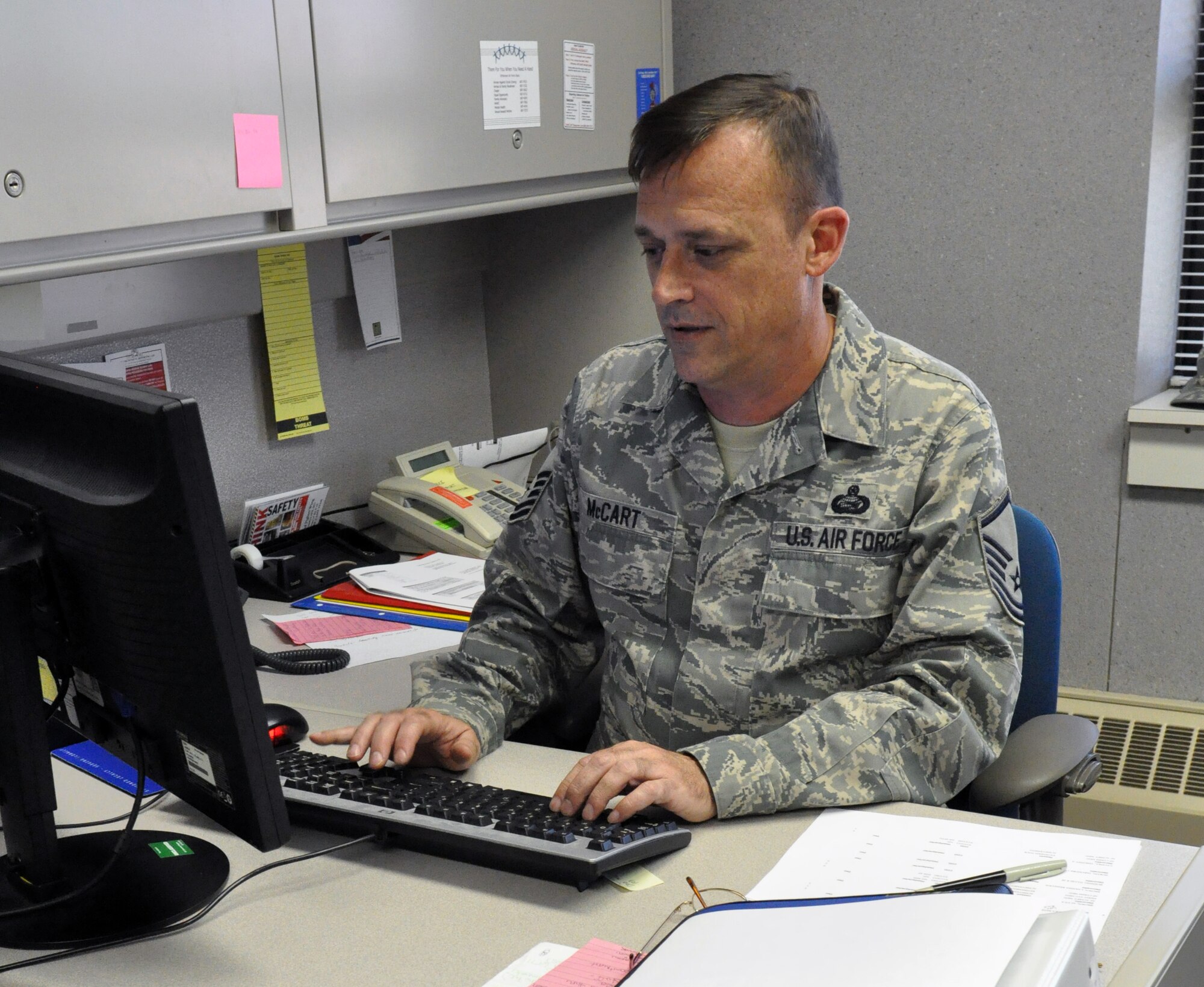 Master Sgt. Phil McCart, 442nd Force Support Squadron, completes his final preparations for the October unit training assembly where the wing will undergo a consolidated unit inspection. Inspectors will look at hundreds of programs and files throughout the wing and present their findings at a briefing, Oct. 16, 2012. The 442nd FSS is part of the 442nd Fighter Wing, an A-10 Thunderbolt II Air Force Reserve unit at Whiteman Air Force Base, Mo. (U.S. Air Force photo by Staff Sgt. Danielle Johnston/Released)