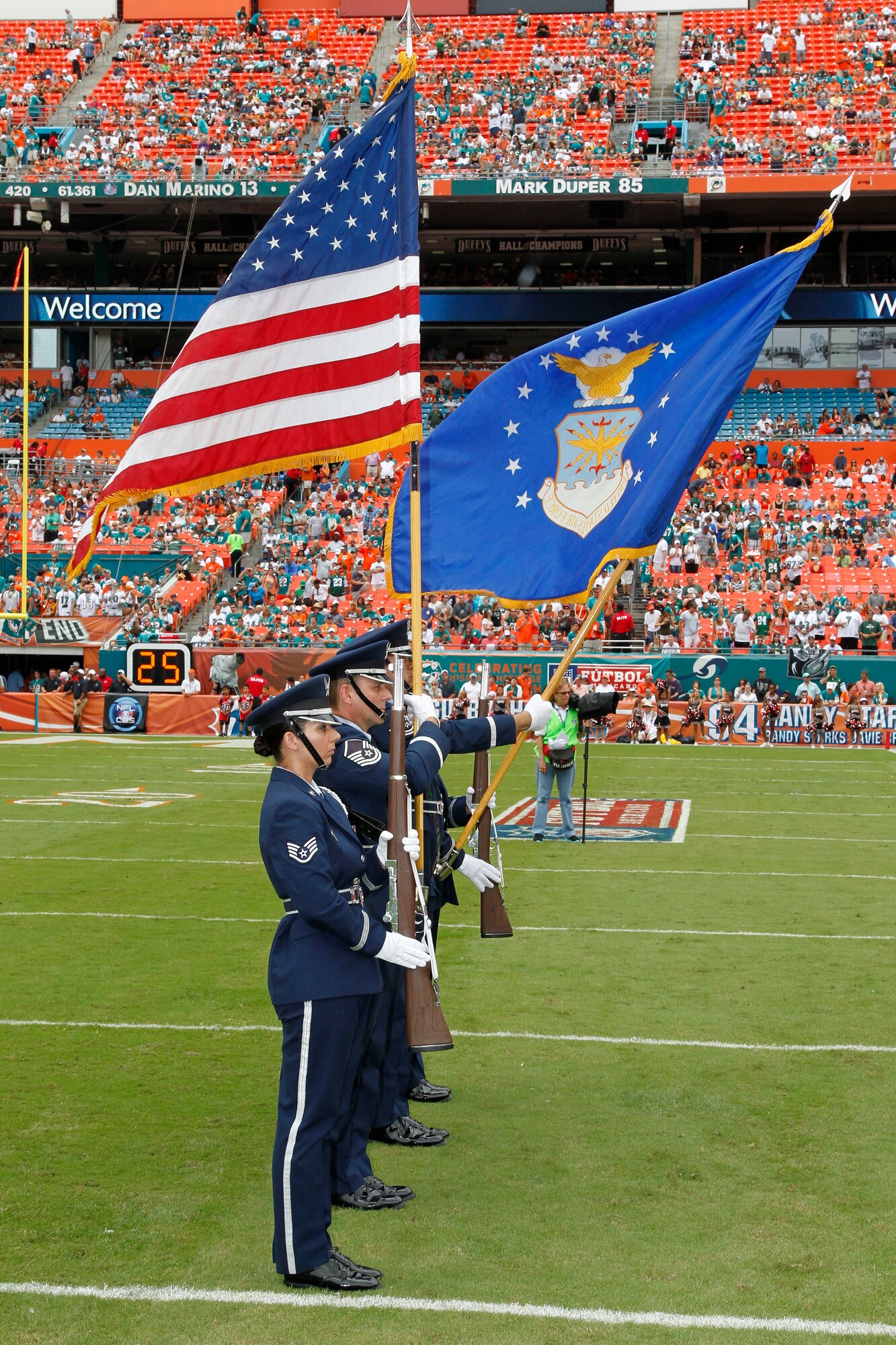 Members of the Homestead Air Reserve Base Honor Guard present the colors for the National Anthem before the Miami Dolphins took on the New York Jets at Sun Life Stadium in Miami Gardens, Fla., Sept. 23. (courtesy photo)