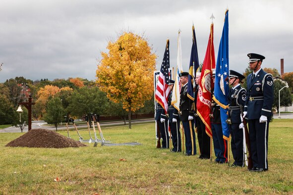 The Joint Services Color Guard showcases the National and Military colors before the official groundbreaking of the Navy Operational Support Center at the 911th Airlift Wing in Pittsburgh, Pa., Oct. 6, 2012. The construction of the 30,600 square foot facility will be completed in early 2014 and will support 290 Navy reservists. The newly built NOSC will receive a Leadership in Energy and Environmental Design certification which is intended to promote design and construction practices that increase profitability while reducing the negative environmental impacts of buildings. The LEED also improves the occupant’s health and well-being. (U.S. Air Force photo by Tech. Sgt. Ralph Van Houtem/Released)