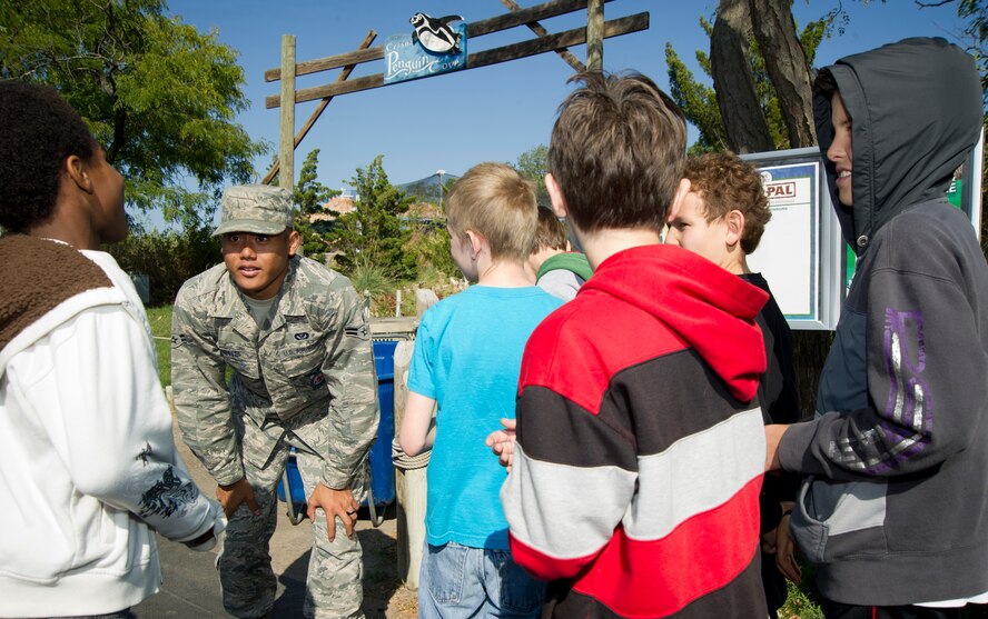 During a safety brief, Airman 1st Class Dylan Inis, 22nd Civil Engineer Squadron firefighter, helps children understand the importance of having a meeting place in case of a fire, Oct. 9, 2012, Wichita, Kan. McConnell’s Airmen joined first responders from the local area to help promote Fire Prevention Week, Oct. 7-13. (U.S. Air Force photo/ Senior Airman Armando A. Schwier-Morales)