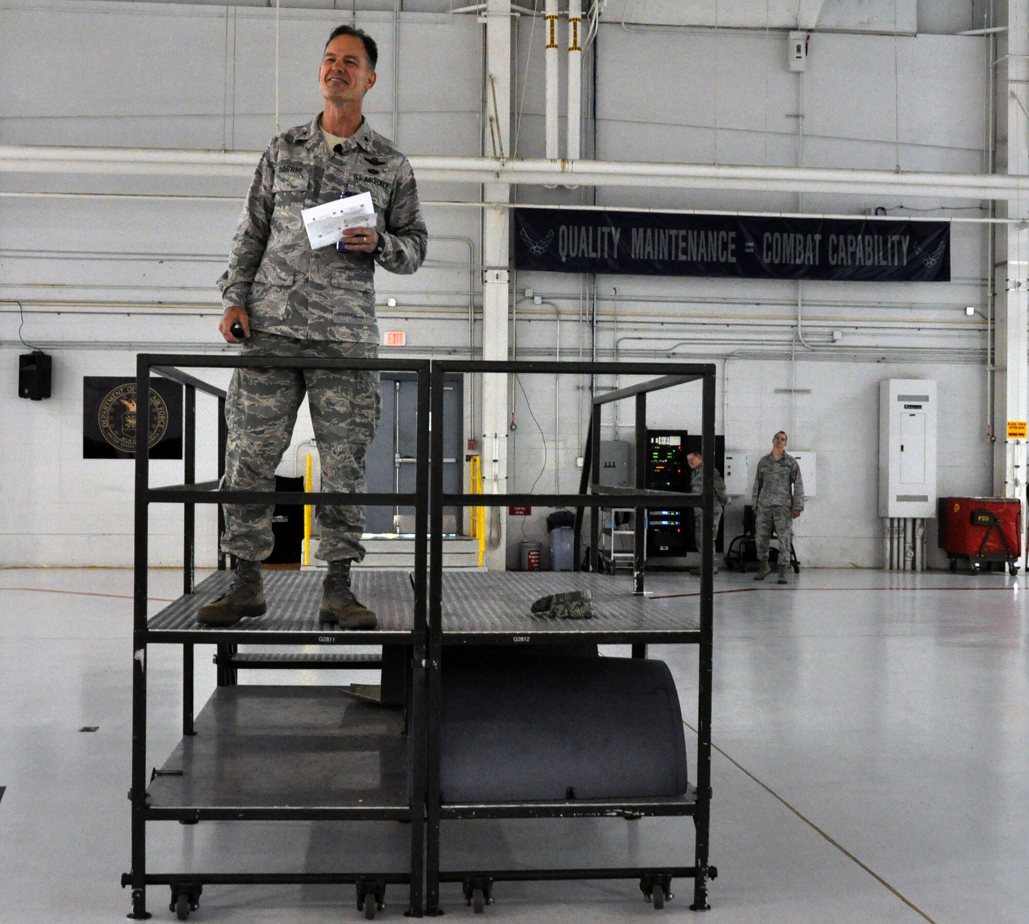 Brig. Gen. Eric S. Overturf, 442nd Fighter Wing commander, speaks during a commander's call to the wing Oct. 10, 2012. During the commander's call, he briefed air reserve technicians, reservists and civilians about the consolidated unit inspection (CUI) beginning Oct. 11, 2012. The 442nd Fighter Wing is an A-10 Thunderbolt II Air Force Reserve unit at Whiteman Air Force Base, Mo. (U.S. Air Force photo by Staff Sgt. Danielle Johnston/Released)