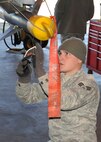 Senior Airman Brandon Oliver, 8th Maintenance Operations Squadron, Kunsan Air Base, Republic of Korea, replaces the argon coolant gas in a missile following a simulated combat mission during Distant Frontier on Eielson Air Force Base, Alaska, Oct. 3, 2012. The coolant keeps the missile cool during flight to ensure all the systems operate appropriately and maintain maximum mission capabilities. (U.S. Air Force photo/Staff Sgt. Jonathan Fowler)