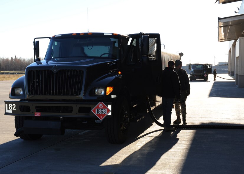 Refueling trucks with the 35th Fighter Squadron, Kunsan Air Base, Republic of Korea, pump fuel into aircraft following missions during Distant Frontier on Eielson Air Force Base, Alaska, Oct. 3, 2012. Distant Frontier is an exercise that prepares Air Force personnel for Red Flag-Alaska. (U.S. Air Force photo/Staff Sgt. Jonathan Fowler)