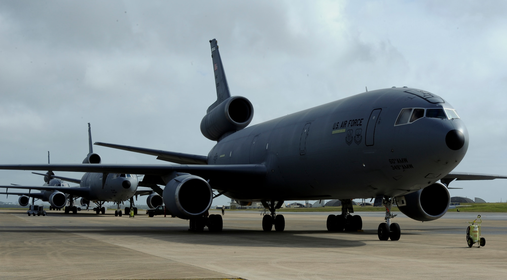 Three visiting U.S. Air Force KC-10 Extenders stand ready to conduct air-to-air refueling missions on Kadena Air Base, Japan, Oct. 10, 2012. The KC-10 Extender's six fuel tanks carry more than 356,000 pounds of fuel - almost twice as much as KC-135 Stratotankers, like the ones assigned to Kadena's 909th Air Refueling Squadron. (U.S. Air Force photo/Airman 1st Class Justin Veazie)

