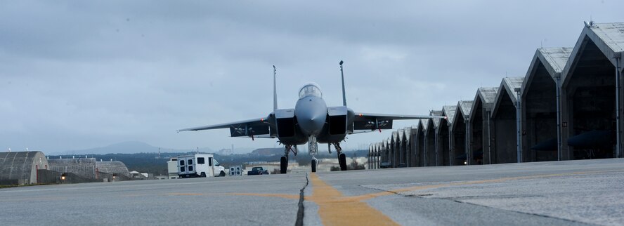 A U.S. Air Force F-15 Eagle taxis on a runway on Kadena Air Base, Japan, Oct. 10, 2012. The F-15's superior maneuverability and acceleration are achieved through high engine thrust-to-weight ratio and low wing loading. (U.S. Air Force photo/Airman 1st Class Justin Veazie)