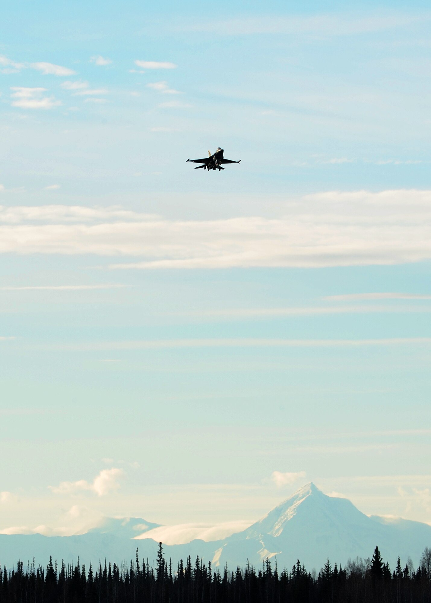 An F-16 Fighting Falcon with the 18th Aggressor Squadron prepares to land following a simulated combat mission during Distant Frontier on Eielson Air Force Base, Alaska, Oct. 3, 2012. The 18th AS’s aircraft acted as the “enemy” during Distant Frontier and Red Flag-Alaskato test the combat capabilities of participating units through various simulated scenarios. (U.S. Air Force photo/Staff Sgt. Jonathan Fowler)