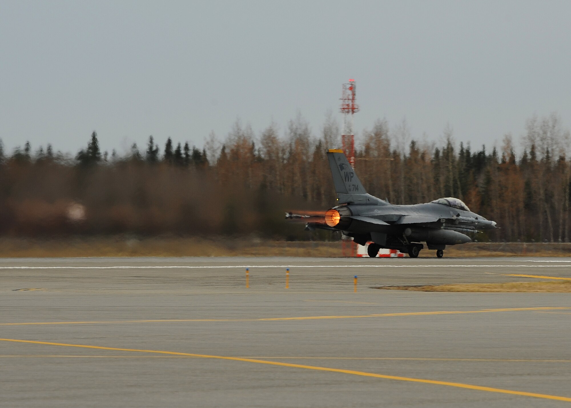 An F-16 Fighting Falcon from the 8th Fighter Wing at Kunsan Air Base takes off during Distant Frontier on Eielson Air Force Base, Alaska, Oct. 2, 2012. This is one of 14 aircraft sent to Eielson to participate in Distant Frontier and Red Flag-Alaska, where personnel and equipment were assessed on their efficiency and effectiveness to perform during certain combat roles. (U.S. Air Force photo/Staff Sgt. Jonathan Fowler)