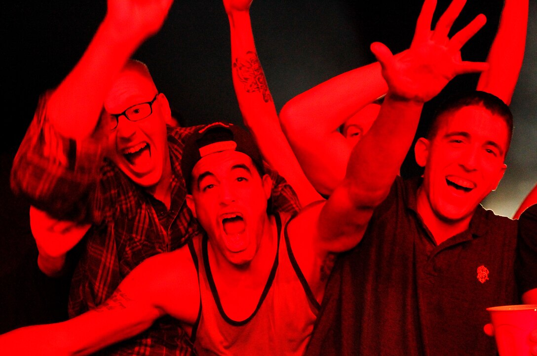 Marines cheer on Hinder during the Sounds of Freedom 2012 concert at Lance Cpl. Torrey L. Gray Field.