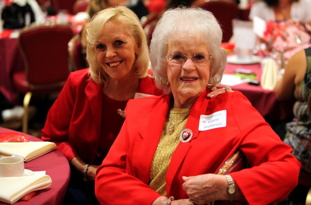 Maxine Matherson and Judi Graichen, event sponsors, enjoy food and conversation during A Heart Event Fall Music Concert and Luncheon, here, Oct. 6. The event provided more than 150 active duty service women and military wives an opportunity to develop new friendships with members and representatives of the local military community.