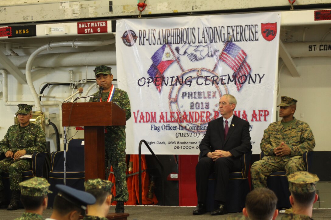 Vice Adm. Alexander P. Pama of the armed forces of the Philippines shares his point of view about the importance of the Amphibious Landing Exercise 2013 during the opening ceremony. PHIBLEX '13 is a bilateral air-ground and amphibious training exercise between the U.S. armed forces and the armed forces of the Philippines to improve interoperability, increase readiness and the ability to respond in the event of a natural disaster, and build professional and personal relationships. The exercise ensures disaster relief efforts are more responsive, efficient and effective. (U.S. Marine Corps photo by Cpl. Nicholas Rhoades)


