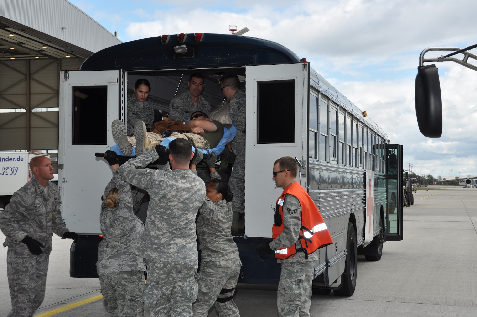Patients from Bagram’s Contingency Aeromedical Staging Facility are loaded onto a bus at Ramstein Air Base, Germany, headed for Landstuhl Regional Medical Center or Ramstein's CASF. The Air Force's Strategic Transitory Care process ensures wounded warriors are kept safe and receive consistent care throughout the journey from Afghanistan through Germany to the United States. (U.S. Air Force photo/TSgt Shawn David McCowan)