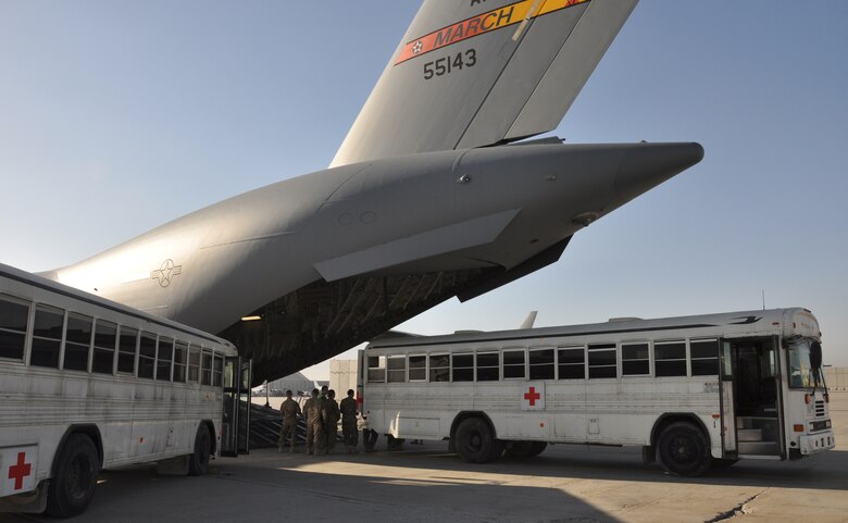 Patients from Bagram’s Contingency Aeromedical Staging Facility are loaded onto a C-17 Globemaster II before departing for Ramstein Air Base, Germany. The Air Force's Strategic Transitory Care process ensures wounded warriors are kept safe and receive consistent care throughout the journey from Afghanistan through Germany to the United States. (U.S. Air Force photo/TSgt Shawn David McCowan)